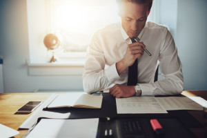 A trained paralegal overlooks numerous legal documents